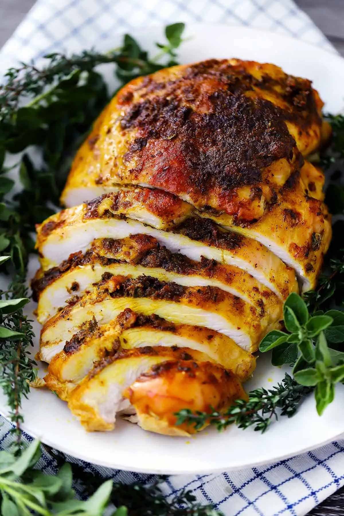 Sliced boneless turkey breast with an herb-butter rub